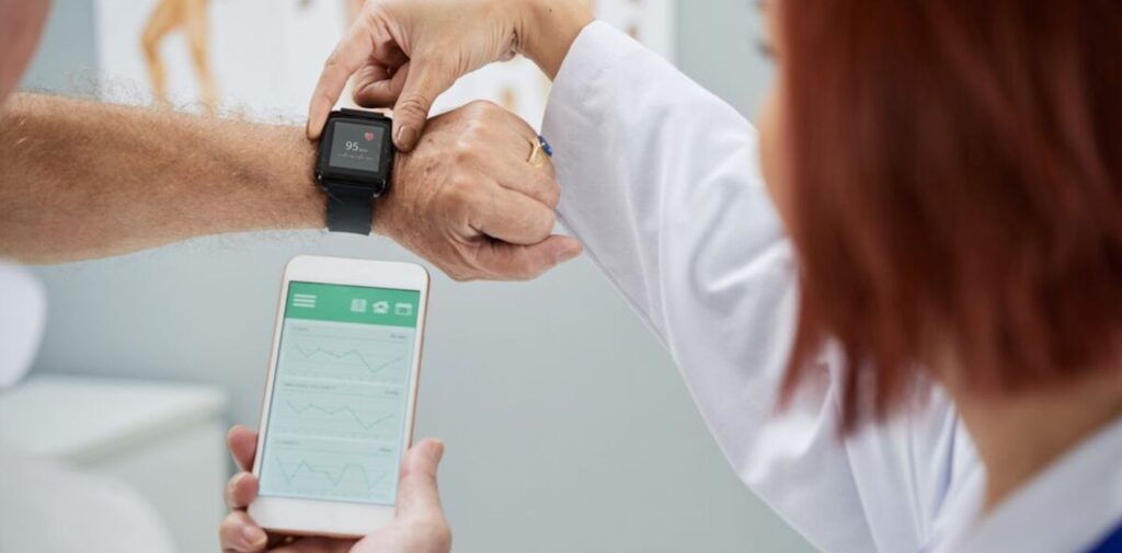 The-Role-of-Technology-in-Indias-Healthcare-Revolution-Since-2000-Health-Apps-and-Wearables-Empowering-Patients